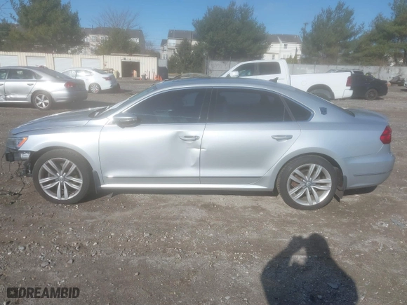 2016 Volkswagen Passat 1.8T SEL with VIN 1VWCT7A35GC011006, listed as a IAAI auction lot 41039744 with 123,422 mi miles. Bid and sale history available at carsss.com. Image 14.