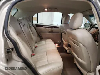2005 Lincoln Town Car Signature z VIN 1LNHM81W55Y670818, wystawiony jako Copart lot #53279985 z przebiegiem 95 939 mil mil oraz Szkoda całkowita • Salvage title. Historia ofert i sprzedaży dostępna na DreamBid. Obrazek 10.