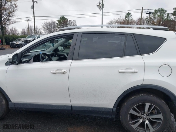 2017 Toyota RAV4 XLE with VIN JTMRFREV6HJ716907, listed as a IAAI auction lot 41056444 with 118,335 mi miles. Bid and sale history available at carsss.com. Image 14.