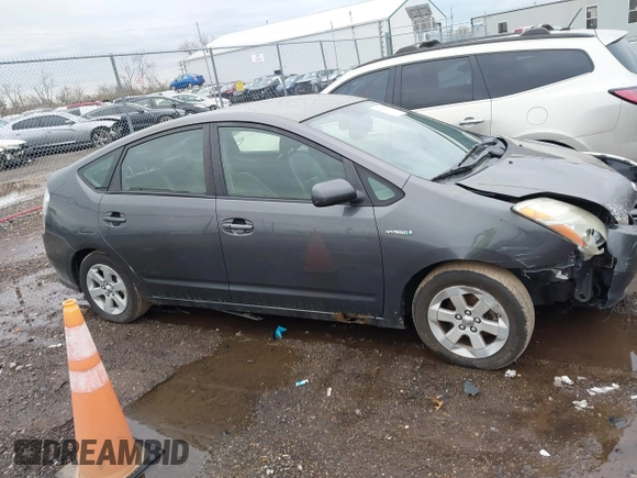 2007 Toyota Prius with VIN JTDKB20U773235084, listed as a IAAI auction lot 41842714 with 233,542 mi miles and . Bid and sale history available at DreamBid. Image 14.