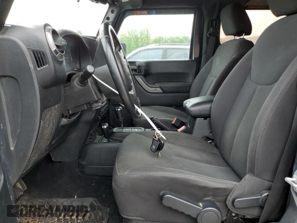 2016 Jeep Wrangler Black Bear with VIN 1C4AJWAGXGL209318, listed as a Copart auction lot 59539755 with 108,306 mi miles and Salvage title. Bid and sale history available at DreamBid. Image 7.