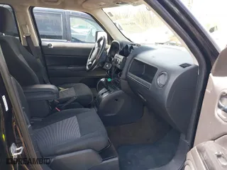 2014 Jeep Patriot Latitude with VIN 1C4NJRFB3ED615996, listed as a IAAI auction lot 41871099 with 120,000 mi miles. Bid and sale history available at carsss.com. Image 5.
