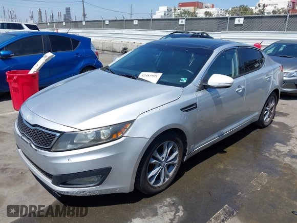 2013 Kia Optima EX with VIN 5XXGN4A75DG139872, listed as a IAAI auction lot 42483921 with 120,167 mi miles and . Bid and sale history available at DreamBid. Image 2.