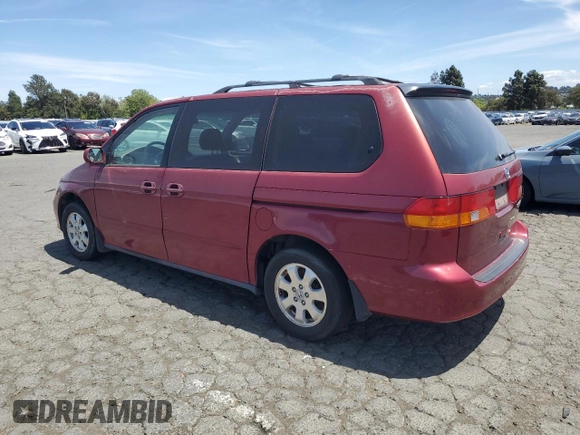 2004 Honda Odyssey EX-L with VIN 5FNRL18014B031578, listed as a Copart auction lot 56938795 with 241,085 mi miles and Salvage title. Bid and sale history available at DreamBid. Image 2.