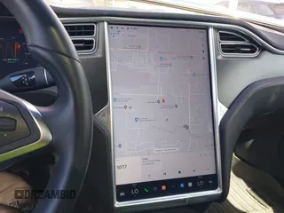 2016 Tesla Model S 90D with VIN 5YJSA1E22GF155747, listed as a IAAI auction lot 42630085 with 97,896 mi miles and . Bid and sale history available at DreamBid. Image 18.