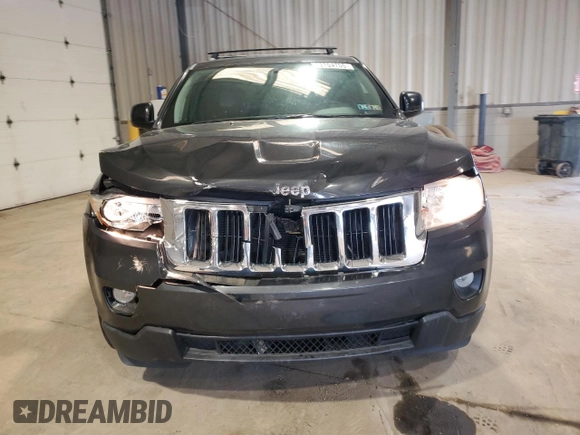 2011 Jeep Grand Cherokee Laredo with VIN 1J4RS4GG9BC517059, listed as a Copart auction lot 52704705 with 120,171 mi miles and Salvage Title. Bid and sale history available at DreamBid. Image 5.