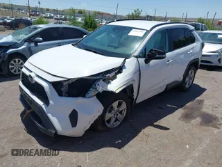 2019 Toyota RAV4 Hybrid LE with VIN 2T3MWRFV2KW026931, listed as a IAAI auction lot 42667582 with 93,147 mi miles and . Bid and sale history available at DreamBid. Image 2.