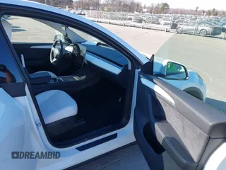 2023 Tesla Model Y Long Range with VIN 7SAYGDEE5PA094253, listed as a IAAI auction lot 41701966 with 29,458 mi miles and . Bid and sale history available at DreamBid. Image 5.