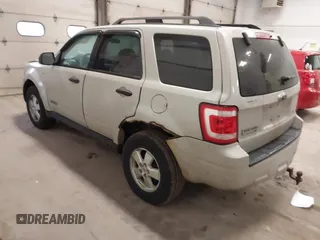 2008 Ford Escape XLT with VIN 1FMCU93128KC67338, listed as a IAAI auction lot 42099606 with 188,817 mi miles. Bid and sale history available at carsss.com. Image 3.