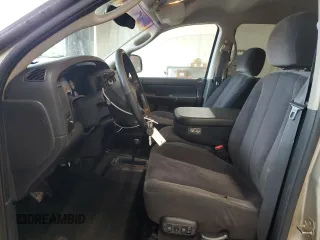 2002 Dodge 1500 with VIN 1D7HU18N82S706899, listed as a Copart auction lot 57672685 with 148,657 mi miles and Salvage title. Bid and sale history available at DreamBid. Image 7.