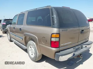 2004 Chevrolet Suburban LT with VIN 1GNEC16Z64J117498, listed as a IAAI auction lot 42005973 with 246,938 mi miles. Bid and sale history available at carsss.com. Image 3.