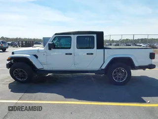 2022 Jeep Gladiator High Altitude with VIN 1C6HJTFG1NL167518, listed as a IAAI auction lot 41838411 with 20,885 mi miles and . Bid and sale history available at DreamBid. Image 14.