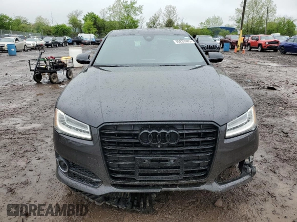 2017 Audi A8 z VIN WAU44AFD0HN004258, wystawiony jako Copart lot #55283985 z przebiegiem 128 059 mil mil oraz Szkoda całkowita • Salvage title. Historia ofert i sprzedaży dostępna na DreamBid. Obrazek 5.