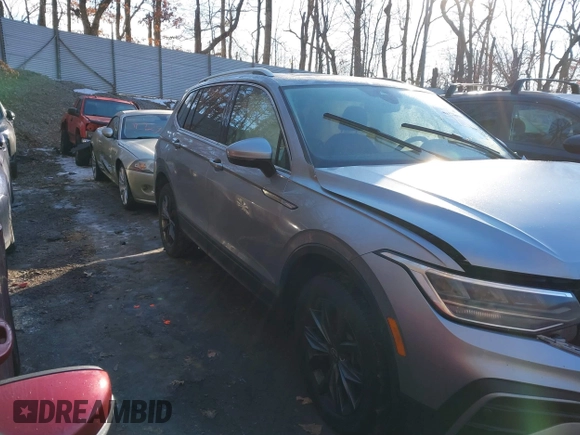 2023 Volkswagen Tiguan SE with VIN 3VVMB7AX7PM017807, listed as a IAAI auction lot 41422055 with 23,974 mi miles and . Bid and sale history available at DreamBid. Image 14.