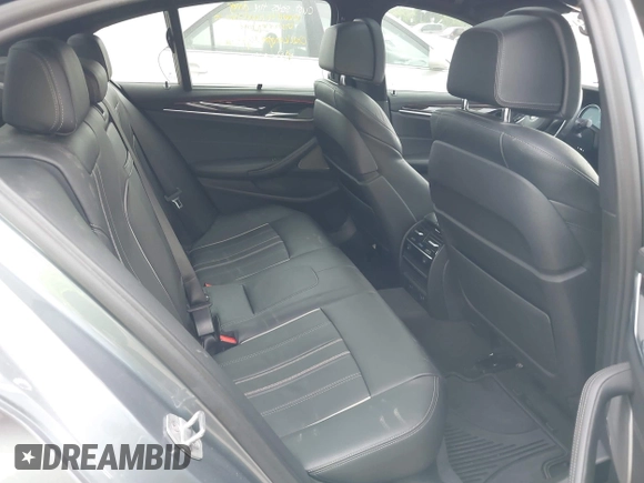 2018 BMW 5 Series M550i xDrive with VIN WBAJB9C55JB035694, listed as a IAAI auction lot 42122730 with 61,561 mi miles and . Bid and sale history available at DreamBid. Image 8.