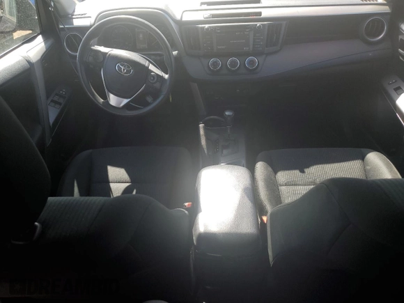 2018 Toyota RAV4 LE with VIN 2T3BFREV6JW739046, listed as a Copart auction lot 57475695 with 81,410 mi miles and Salvage title. Bid and sale history available at DreamBid. Image 8.