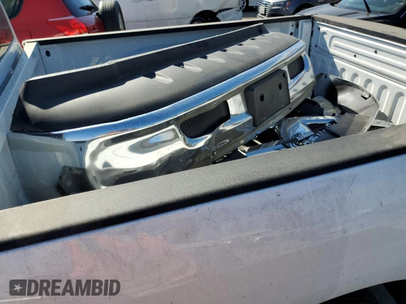 2023 Ram 1500 Tradesman with VIN 1C6RR7FTXPS588759, listed as a Copart auction lot 71082284 with 31,945 mi miles and Salvage title. Bid and sale history available at DreamBid. Image 12.