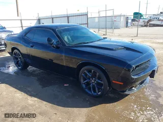 2021 Dodge Challenger SXT with VIN 2C3CDZAGXMH531228, listed as a IAAI auction lot 41473536 with 47,650 mi miles. Bid and sale history available at carsss.com. Image 1.