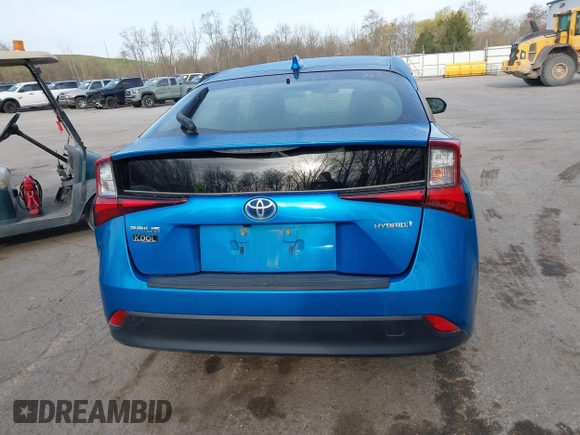 2021 Toyota Prius L Eco with VIN JTDKAMFU5M3145949, listed as a IAAI auction lot 42113123 with 127,872 mi miles and . Bid and sale history available at DreamBid. Image 16.
