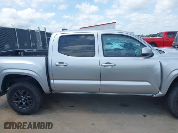 2023 Toyota Tacoma SR with VIN 3TYCZ5AN4PT149730, listed as a IAAI auction lot 42083146 with 31,731 mi miles and . Bid and sale history available at DreamBid. Image 13.