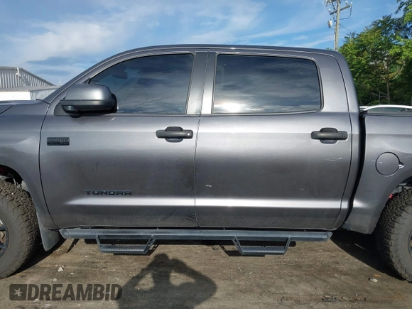 2021 Toyota Tundra SR5 with VIN 5TFDY5F19MX004939, listed as a IAAI auction lot 42197440 with 94,299 mi miles and . Bid and sale history available at DreamBid. Image 14.