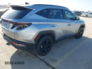 2023 Hyundai Tucson SEL with VIN 5NMJBCAE2PH266771, listed as a IAAI auction lot 41561131 with 34,256 mi miles and . Bid and sale history available at DreamBid. Image 4.