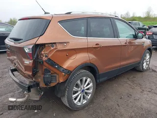2017 Ford Escape Titanium with VIN 1FMCU0JD3HUB20846, listed as a IAAI auction lot 42182260 with 28,610 mi miles and . Bid and sale history available at DreamBid. Image 4.