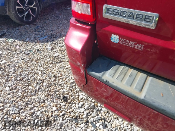 2009 Ford Escape XLS with VIN 1FMCU02759KC80412, listed as a IAAI auction lot 42228138 with 181,786 mi miles and . Bid and sale history available at DreamBid. Image 16.