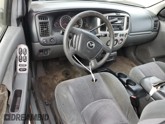 2003 Mazda Tribute LX with VIN 4F2YZ94123KM49852, listed as a Copart auction lot 71779054 with 263,938 mi miles and Salvage Title. Bid and sale history available at carsss.com. Image 8.