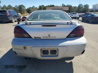 2004 Pontiac Grand Am SE1 with VIN 1G2NF52EX4M640648, listed as a Copart auction lot 48903945 with 303,027 mi miles and Salvage title. Bid and sale history available at DreamBid. Image 6.