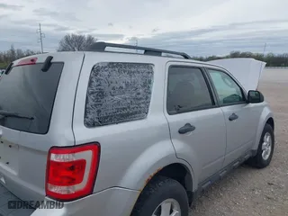 2011 Ford Escape XLT with VIN 1FMCU9D72BKB26439, listed as a IAAI auction lot 41914514 with 242,172 mi miles. Bid and sale history available at carsss.com. Image 6.