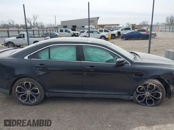 2013 Ford Taurus SHO z VIN 1FAHP2KT6DG174191, wystawiony jako IAAI lot #41752293 z przebiegiem 147 607 mil mil oraz . Historia ofert i sprzedaży dostępna na DreamBid. Obrazek 14.