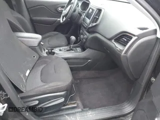 2019 Jeep Cherokee Latitude with VIN 1C4PJLCB4KD220229, listed as a IAAI auction lot 41179101 with 63,099 mi miles and . Bid and sale history available at DreamBid. Image 5.