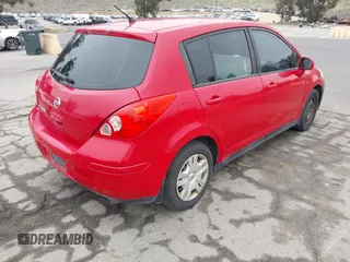 2012 Nissan Versa S with VIN 3N1BC1CP2CL369757, listed as a IAAI auction lot 41948982 with 219,466 mi miles. Bid and sale history available at carsss.com. Image 4.