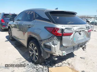 2020 Lexus RX 350 with VIN 2T2HZMAA3LC168454, listed as a IAAI auction lot 41822626 with 91,096 mi miles and . Bid and sale history available at DreamBid. Image 3.