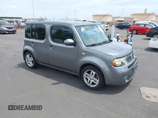2010 Nissan Cube S z VIN JN8AZ2KR4AT158895, wystawiony jako IAAI lot #42055872 z przebiegiem 136 276 mil mil oraz . Historia ofert i sprzedaży dostępna na DreamBid. Obrazek 1.