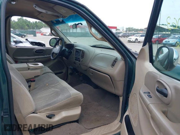 2000 Ford F-150 XL with VIN 1FTRF17W4YNB25801, listed as a IAAI auction lot 42461063 with 173,000 mi miles and . Bid and sale history available at DreamBid. Image 5.
