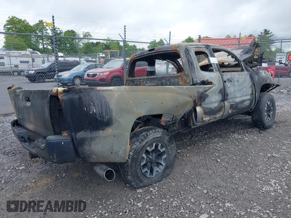 2015 Toyota Tacoma z VIN 5TFUX4EN3FX036158, wystawiony jako IAAI lot #39413433 z przebiegiem 126 878 mil mil oraz . Historia ofert i sprzedaży dostępna na DreamBid. Obrazek 4.