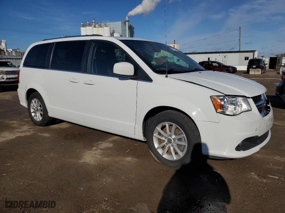 2019 Dodge Grand Caravan SXT with VIN 2C4RDGCG9KR743360, listed as a Copart auction lot 81699554 with 82,527 mi miles and Salvage Title. Bid and sale history available at carsss.com. Image 4.