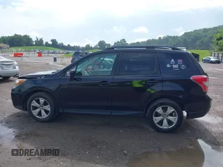 2014 Subaru Forester Premium with VIN JF2SJADC3EH533390, listed as a IAAI auction lot 42525354 with 205,358 mi miles and . Bid and sale history available at DreamBid. Image 14.