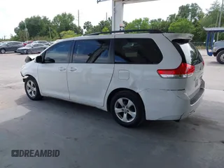 2014 Toyota Sienna LE AAS with VIN 5TDKK3DC2ES513425, listed as a IAAI auction lot 42107820 with 367,844 mi miles and . Bid and sale history available at carsss.com. Image 3.