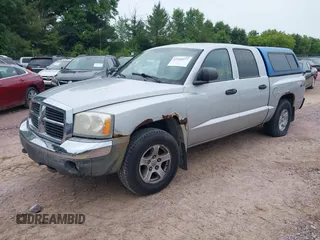 2005 Dodge Dakota SLT with VIN 1D7HW48N65S199887, listed as a IAAI auction lot 42508977 with 192,330 mi miles and . Bid and sale history available at DreamBid. Image 2.