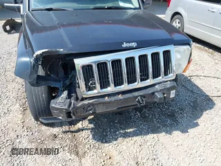 2010 Jeep Commander Sport z VIN 1J4RG4GK0AC157281, wystawiony jako IAAI lot #42581215 z przebiegiem 202 014 mil mil oraz . Historia ofert i sprzedaży dostępna na DreamBid. Obrazek 6.