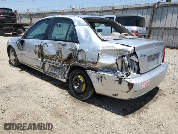2002 Mazda Protege DX z VIN JM1BJ225920543960, wystawiony jako Copart lot #56336555 z przebiegiem 173 874 mil mil oraz Szkoda całkowita • Salvage title. Historia ofert i sprzedaży dostępna na DreamBid. Obrazek 2.
