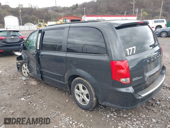 2012 Dodge Grand Caravan SXT with VIN 2C4RDGCG8CR242235, listed as a IAAI auction lot 41922083 with 124,306 mi miles and . Bid and sale history available at DreamBid. Image 3.