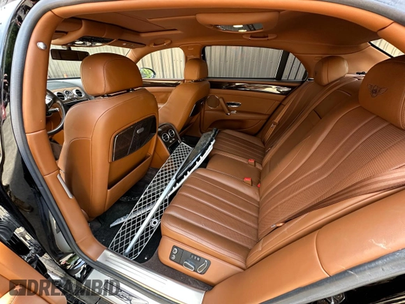 2014 Bentley Flying Spur с VIN SCBEC9ZA4EC094924, выставлен на аукционе Copart как лот 61729205 с пробегом 31 529 миль миль и Списание • Salvage title. История ставок и продаж доступна на DreamBid. Изображение 9.