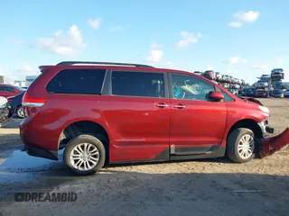 2014 Toyota Sienna XLE with VIN 5TDYK3DCXES473671, listed as a IAAI auction lot 42243030 with 70,052 mi miles and . Bid and sale history available at DreamBid. Image 13.