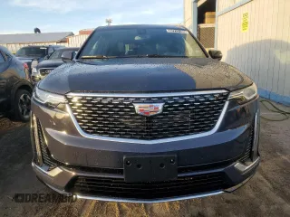 2025 Cadillac XT6 FWD Premium Luxury with VIN 1GYKPCRS3SZ120216, listed as a Copart auction lot 42717185 with 2,176 mi miles and Clean Title. Bid and sale history available at carsss.com. Image 5.