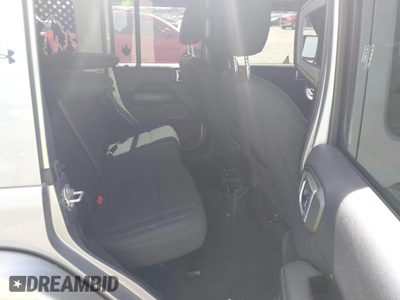 2018 Jeep Wrangler Unlimited Sahara with VIN 1C4HJXEG4JW115522, listed as a IAAI auction lot 42322791 with 68,409 mi miles and . Bid and sale history available at DreamBid. Image 8.