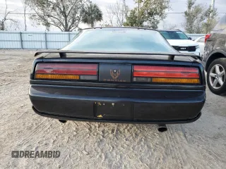 1992 Pontiac Firebird z VIN 1G2FS23T0NL203325, wystawiony jako Copart lot #76359414 z przebiegiem 198 651 mil mil oraz Nie do naprawy • Non repairable. Historia ofert i sprzedaży dostępna na DreamBid. Obrazek 6.